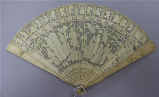 A Chinese ivory brise fan carved with figures